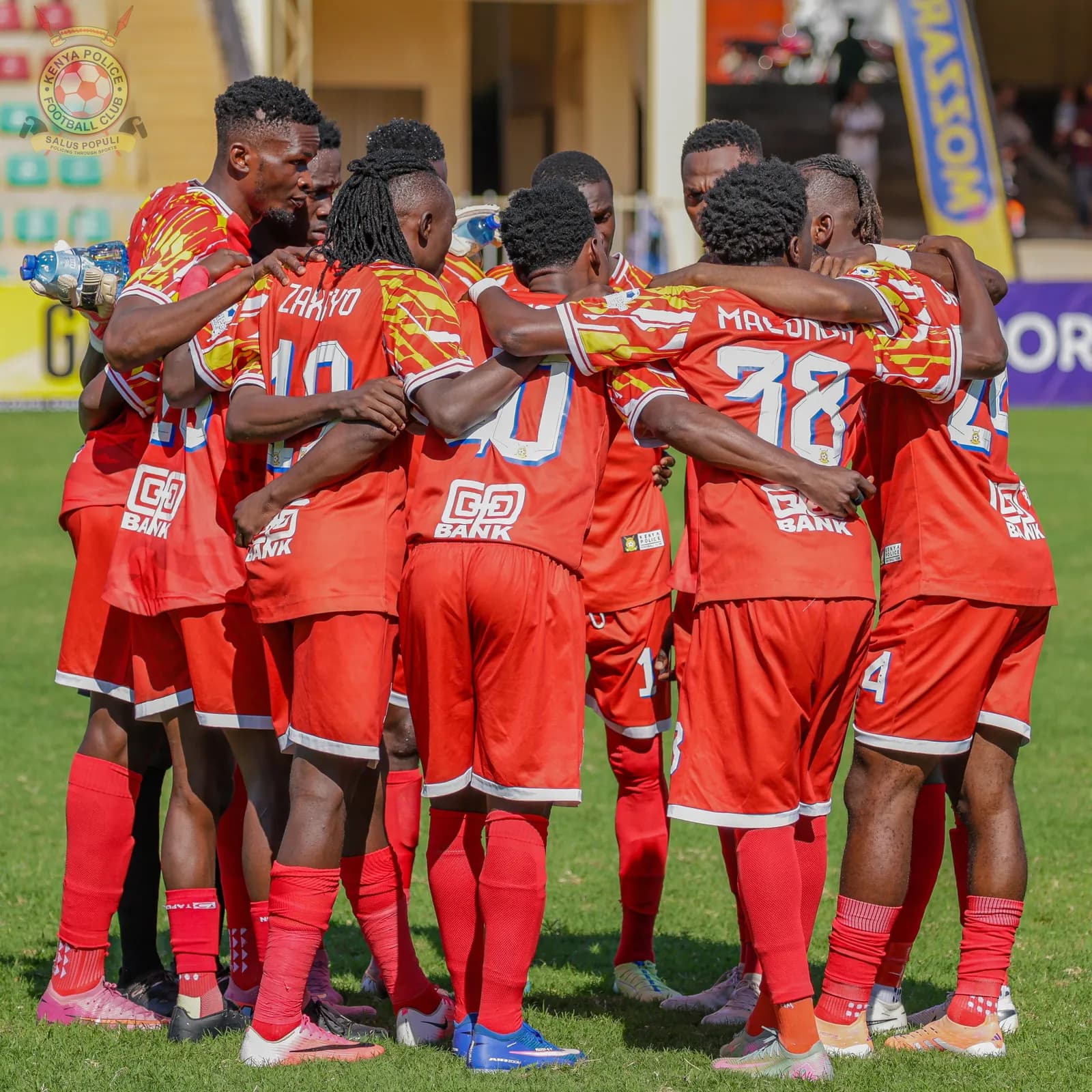 Kenya Police players in a huddle before kick off